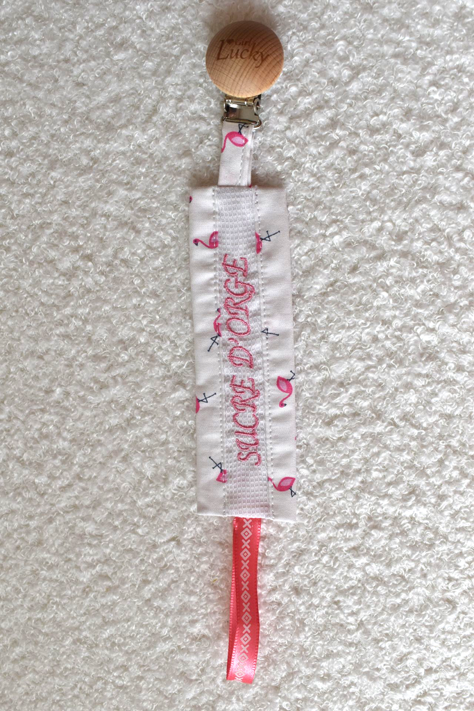 Attache-tétine " sucre d'orge "
